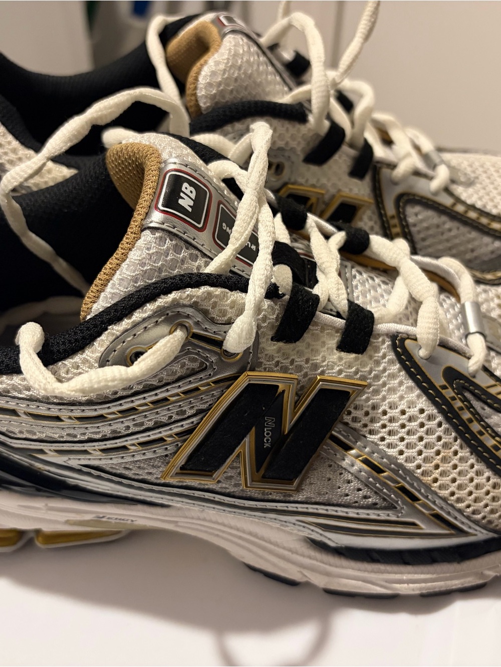 New Balance Mens White Black and Gold Athletic Sneakers